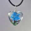 Teal Blue Dried Flower Heart Shaped Resin Pendant