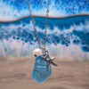 Blue Seaglass Pendant with A Pearl and Starfish - Image 2