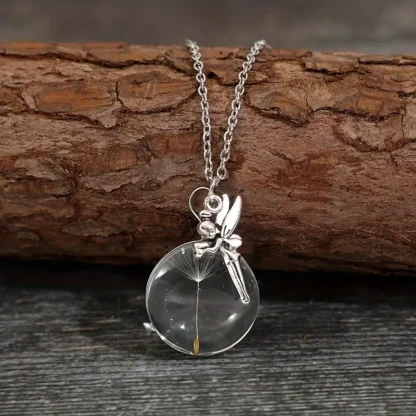 Dried Dandelion Seed in Resin With a Fairy Charm Pendant