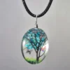 Teal Blue Dried Flower Oval Shaped Resin Pendant - Image 2