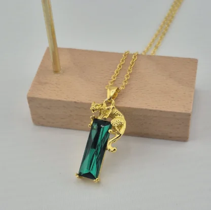 Green Rectangle Synthetic Gem Pendant with Golden Jaguar