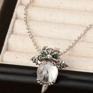 Silvery Baby Dragon Pendant With Green Eyes
