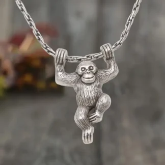 "Banana Bandit" – Silvery Swinging Orangutan Pendant
